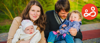 A young family sat together on a park bench.