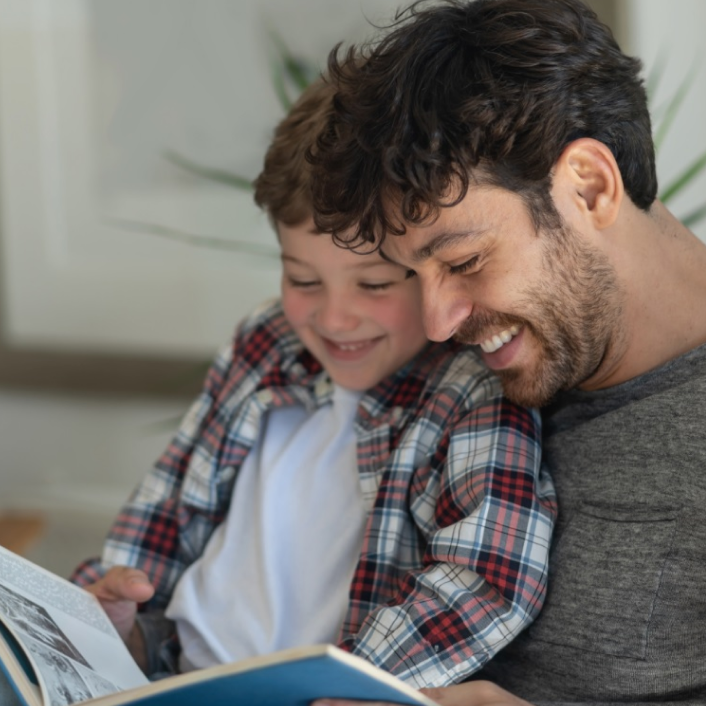 Father reading with son