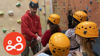 An indoor rock climbing activity organised by Spurgeons BeLeave project
