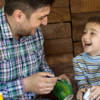 Father and son enjoying time together and engaging in crafting activities