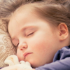 A child sleeping peacefully without the disturbance of nightmares