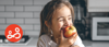 A child eating an apple, and making a healthy eating choice