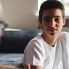 A young man listening to his counsellor during a counselling session