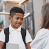 Two children returning to school