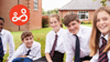 A happy group of young people sitting together on the grass, demonstrating a child's ability to adapt to secondary school transition.