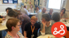 Volunteers of Spurgeons Invisible Walls service, enjoying afternoon tea at a ceremony to honour their work in family prison support. 