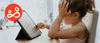 A bored looking young girl searching the web on a tablet device