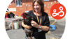 Service Lead Kerry Longhorn holding a chicken during a fun activity day