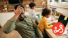 Father stressed, and trying to work from home with children.