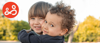 Two little boys hugging