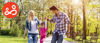 Parents walking with child in the park