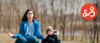 Parent with their child, meditating outdoors to deal with stress 