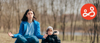 Parent with their child, meditating outdoors to deal with stress