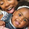 Mother and child playing happily together