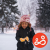 Girl playing in the snow is relaxed, at ease and not affected by any tension within her family at Christmas