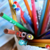 An image showing a pot of pens and pencils, which is a familiar sight for children going back to school