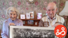 Henry Allen and his wife of 73 years, holding a copy of the Spurgeons Homes staff centenary photograph taken in 1934 