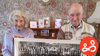 Henry Allen and his wife of 73 years, holding a copy of the Spurgeons Homes staff centenary photograph taken in 1934