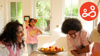 A family spending a happy moment together in their kitchen area.